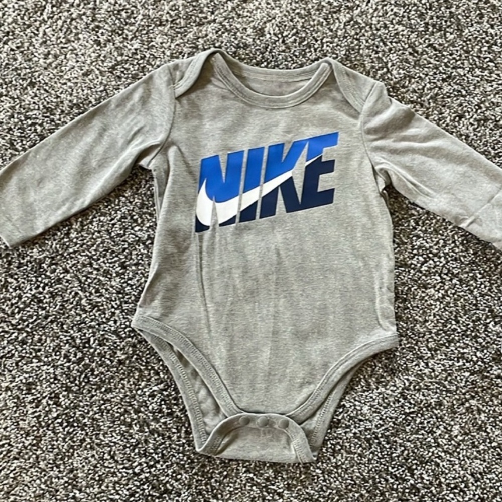 Nike Kids Bodysuit in Gray with Blue Logo